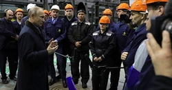 Putyin munkások között