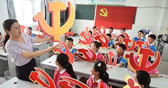 Kína: ahol büszkék a sarlóra és a kalapácsra
